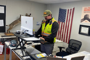 Andrew Everett Working in the Jobsite Trailer